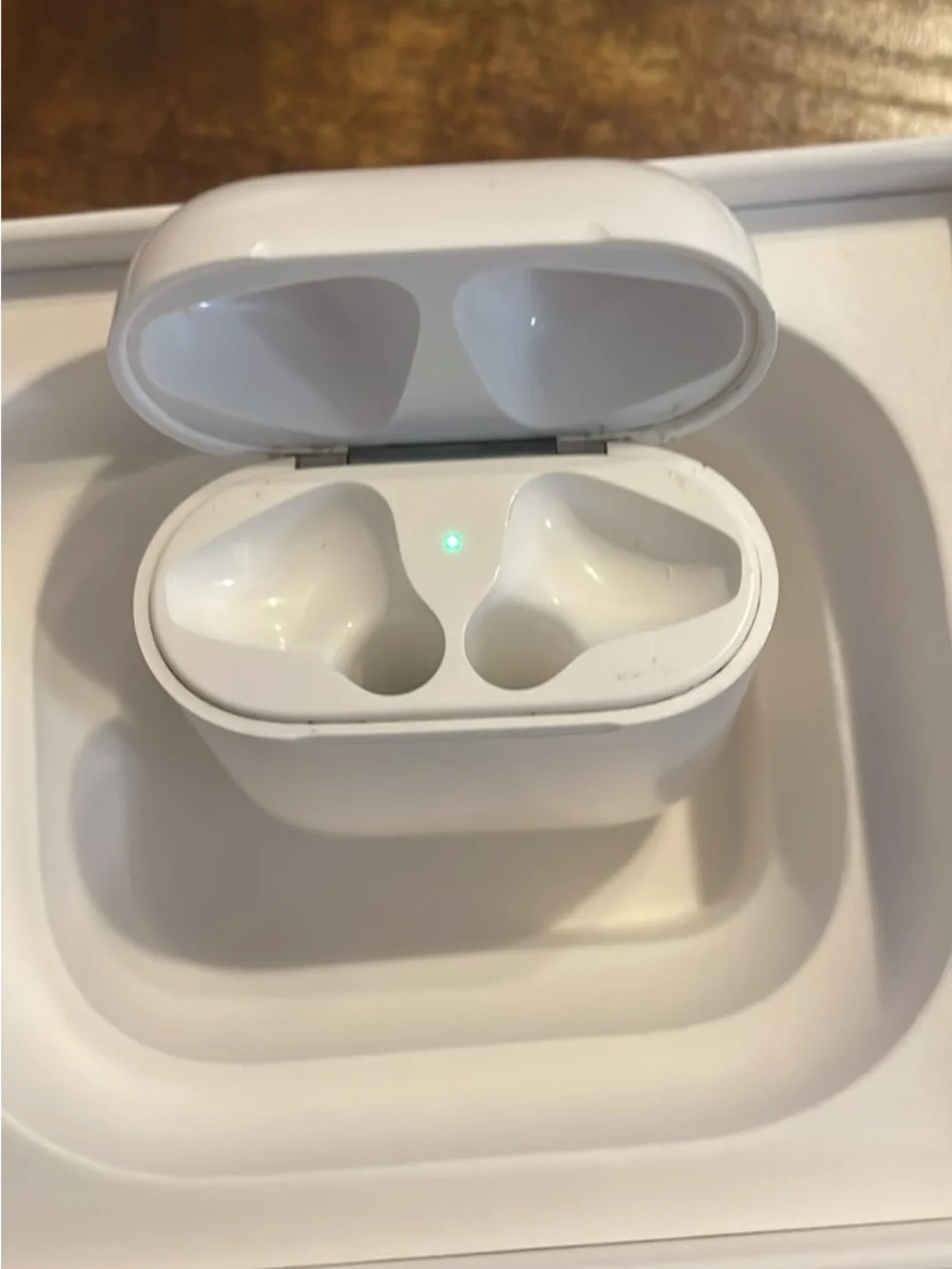 Apple AirPods 2nd Generation with Charging Case (Charging Cord Included)